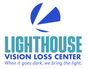 Lighthouse Vision Loss Center Logo, beams of light forming an L, with the words "When it goes dark, we bring the light." beneath.